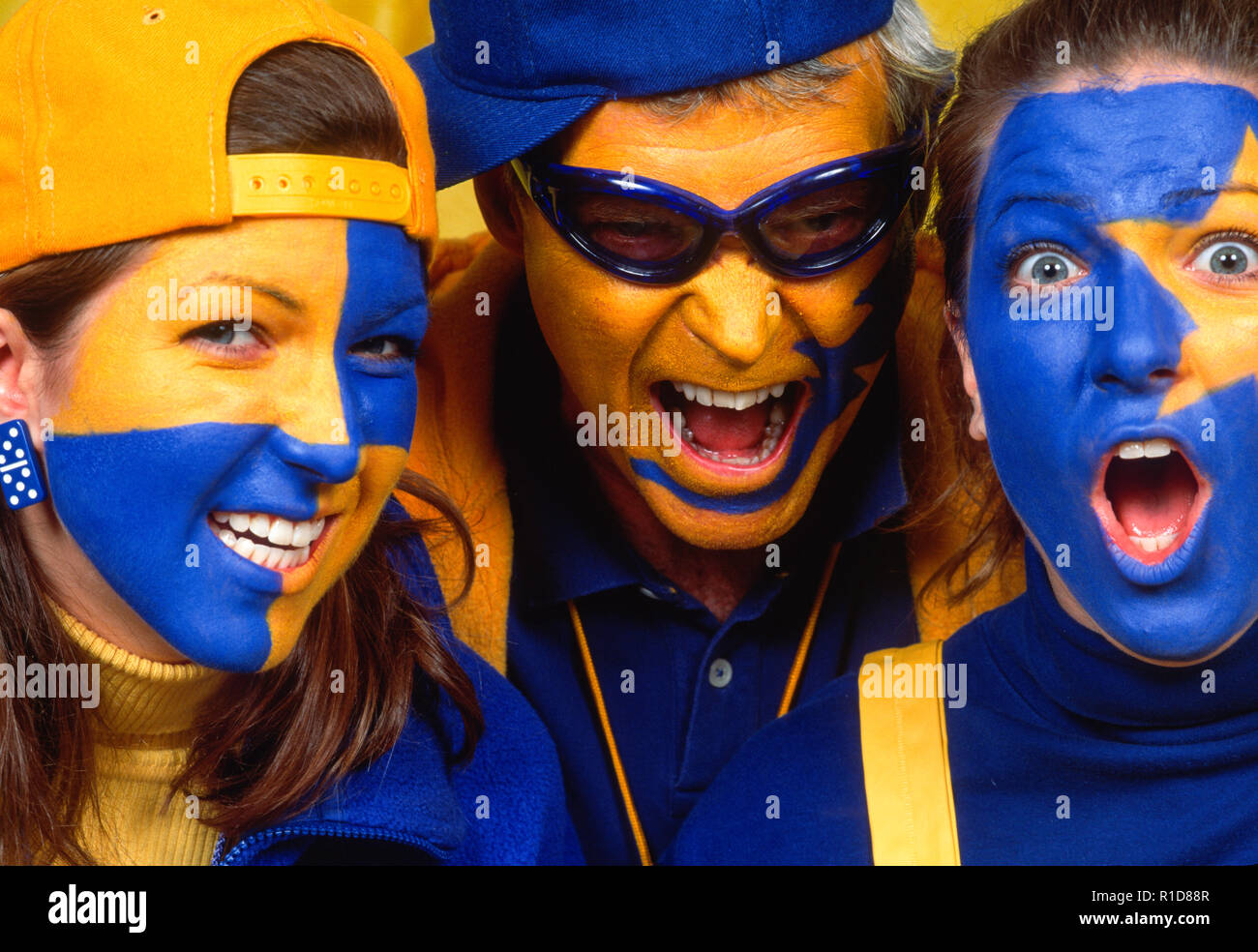 Enthusiastic Sports Fans with Painted Faces at a Game, USA Stock Photo Alamy
