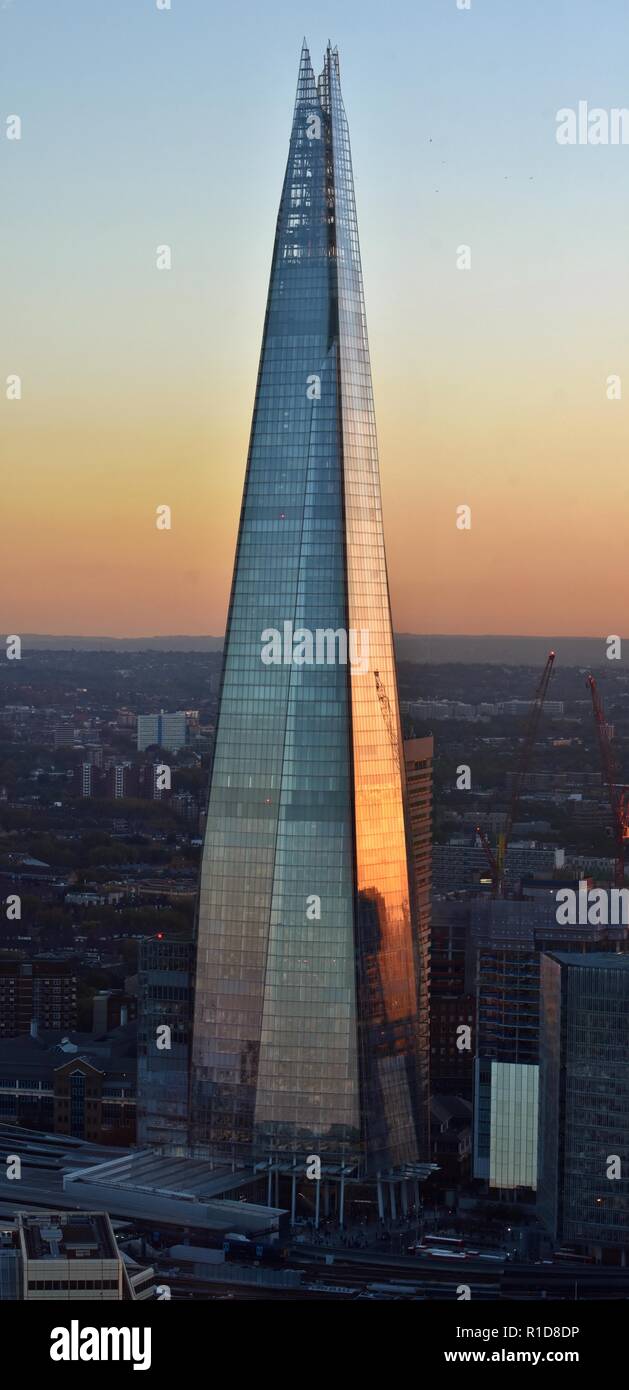 The Shard skyscraper in downtown London, along the South Bank of the Thames River at dusk. Stock Photo