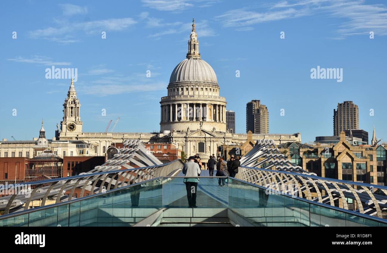 The Millennium Bridge in London, which crosses the Thames River and connects St. Paul's Cathedral to the Tate Modern. Stock Photo