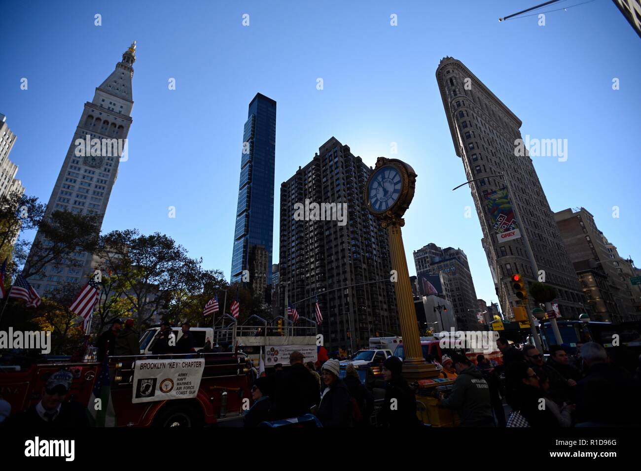 New York, U.S. 11 Nov 2018 A clock reads 11 A.M. as participants prepare to march in New York City’s annual Veterans Day Parade, on the 100th anniversary of the end of World War I. Stock Photo