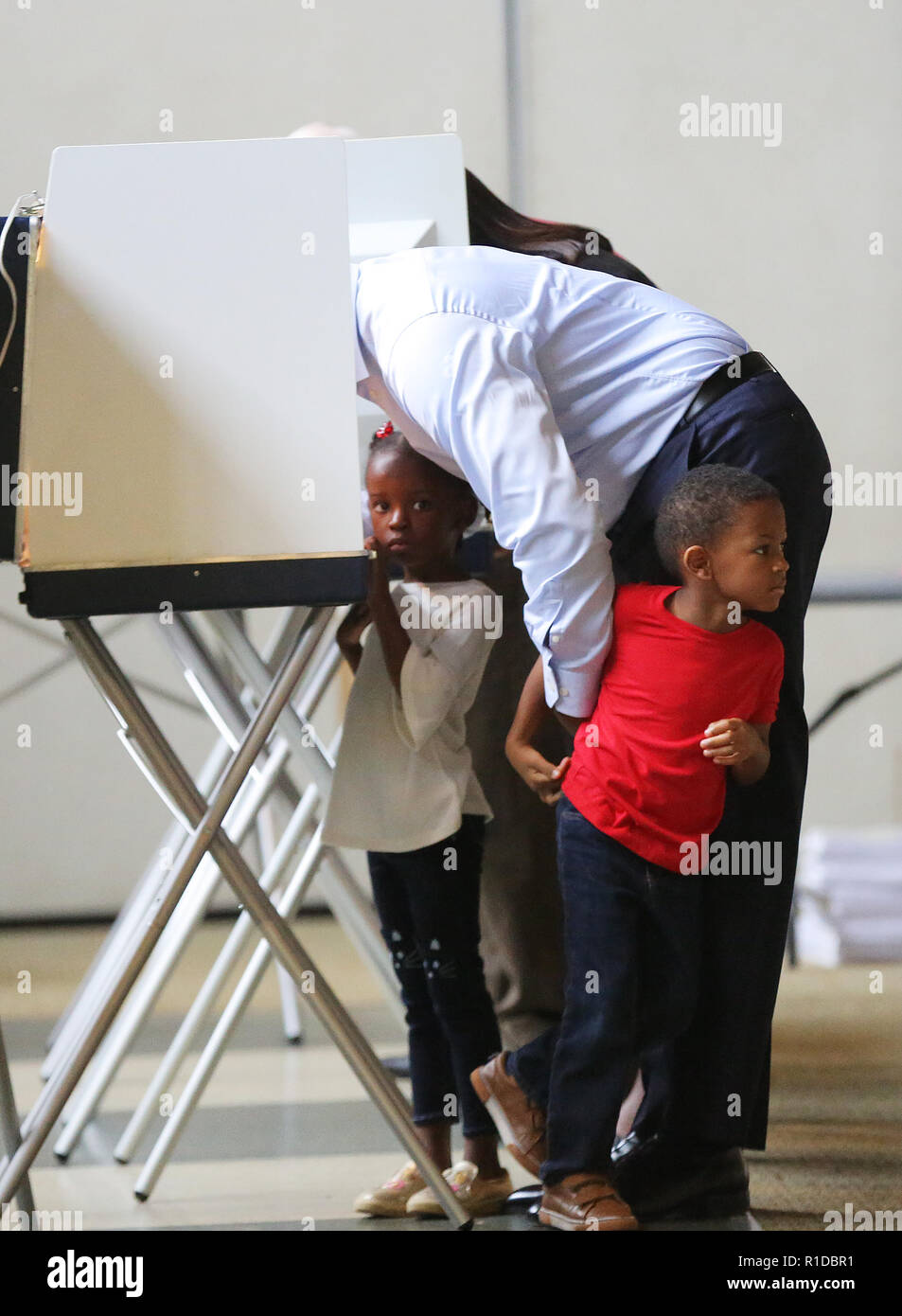 November 6, 2018 - Tallahassee, FLORIDA, U.S - Andrew Gillum, Mayor of Tallahassee and Democratic Candidate for Governor of Florida, votes with his twin children Caroline and Jackson, in Tallahassee, Florida USA  on November 6, 2018. (Credit Image: © Dan Anderson/ZUMA Wire) Stock Photo