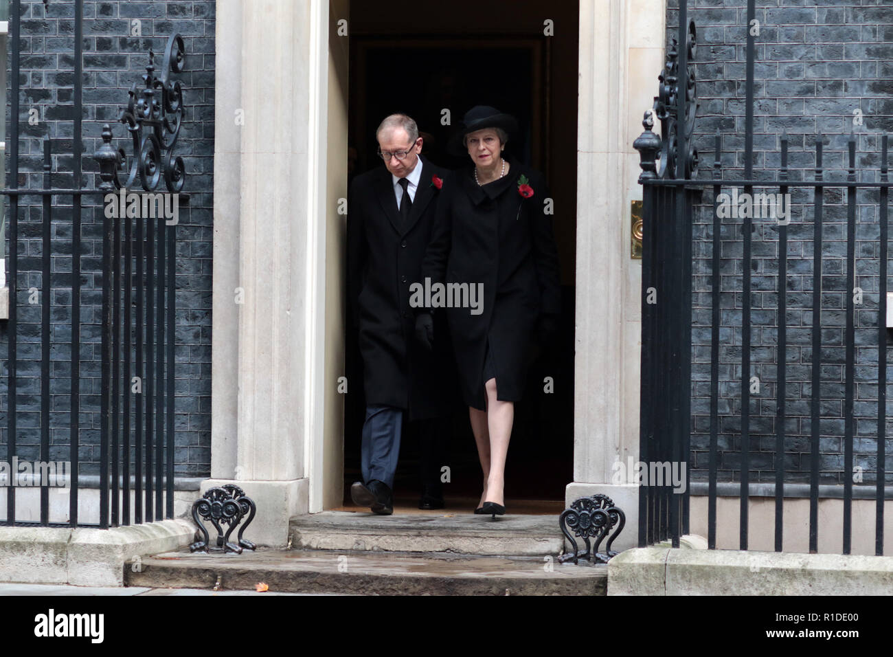 Prime Minister Theresa May and husband Philip leave Downing Street on the way to the Remembrance Sunday ceremony at the Cenotaph in Whitehall. Today marks 100 years since the end of the First World War. Remembrance Sunday, London, on November 11, 2018. Stock Photo