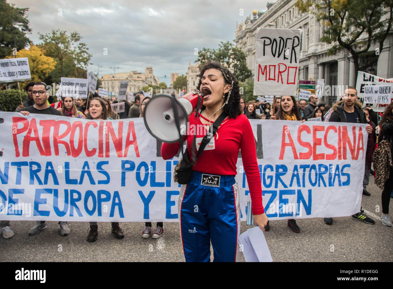 Madrid, Spain. 11th Nov, 2018. A protester chanting slogans with a