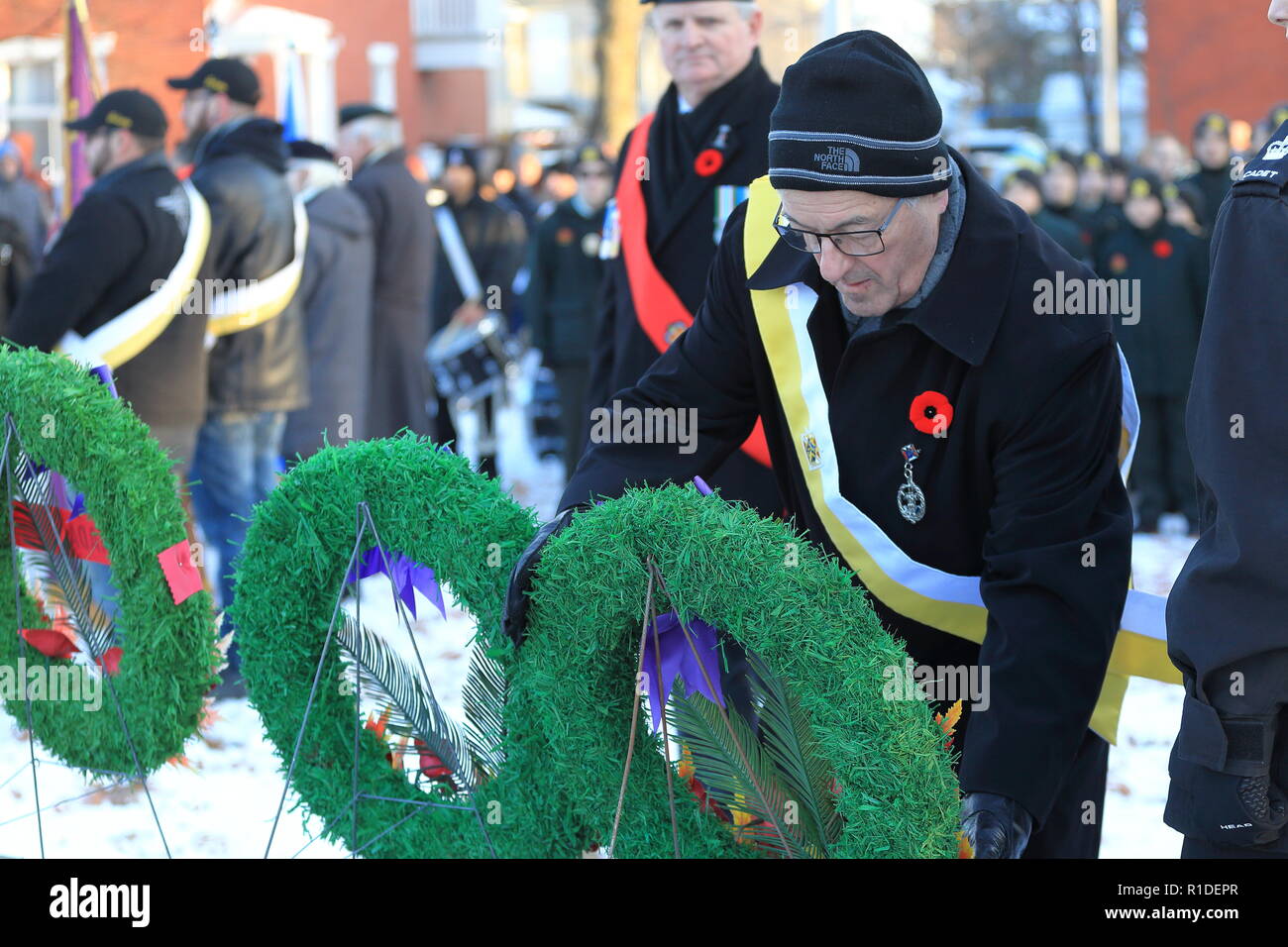 Quebec,Canada 11/11/2018. A veteran lays a wreath at the Remembrance