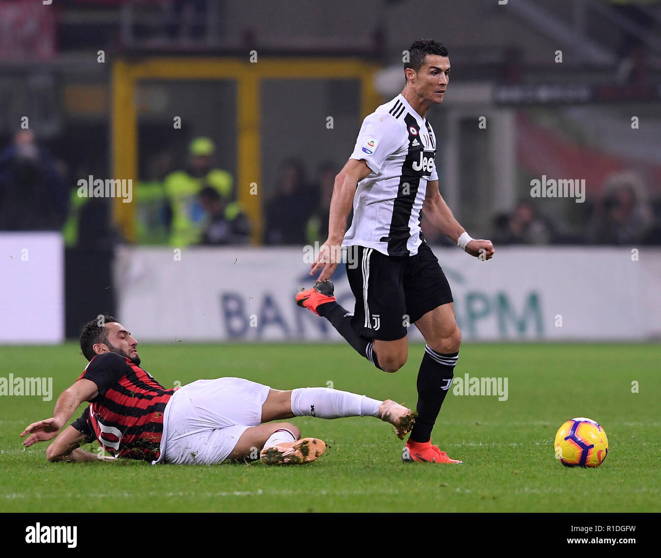 Milan Italy 11th Nov 2018 Cristiano Ronaldo R Of Juventus Vies With Hakan Calhanoglu Of Ac Milan During The Serie A Soccer Match Between Ac Milan And Juventus In Milan Italy Nov