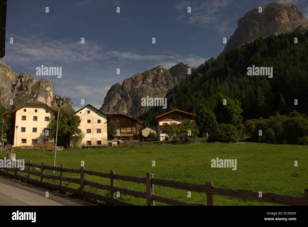 Typical alpine Houses at the way to Sassongher mountain in the italian Dolomites Stock Photo