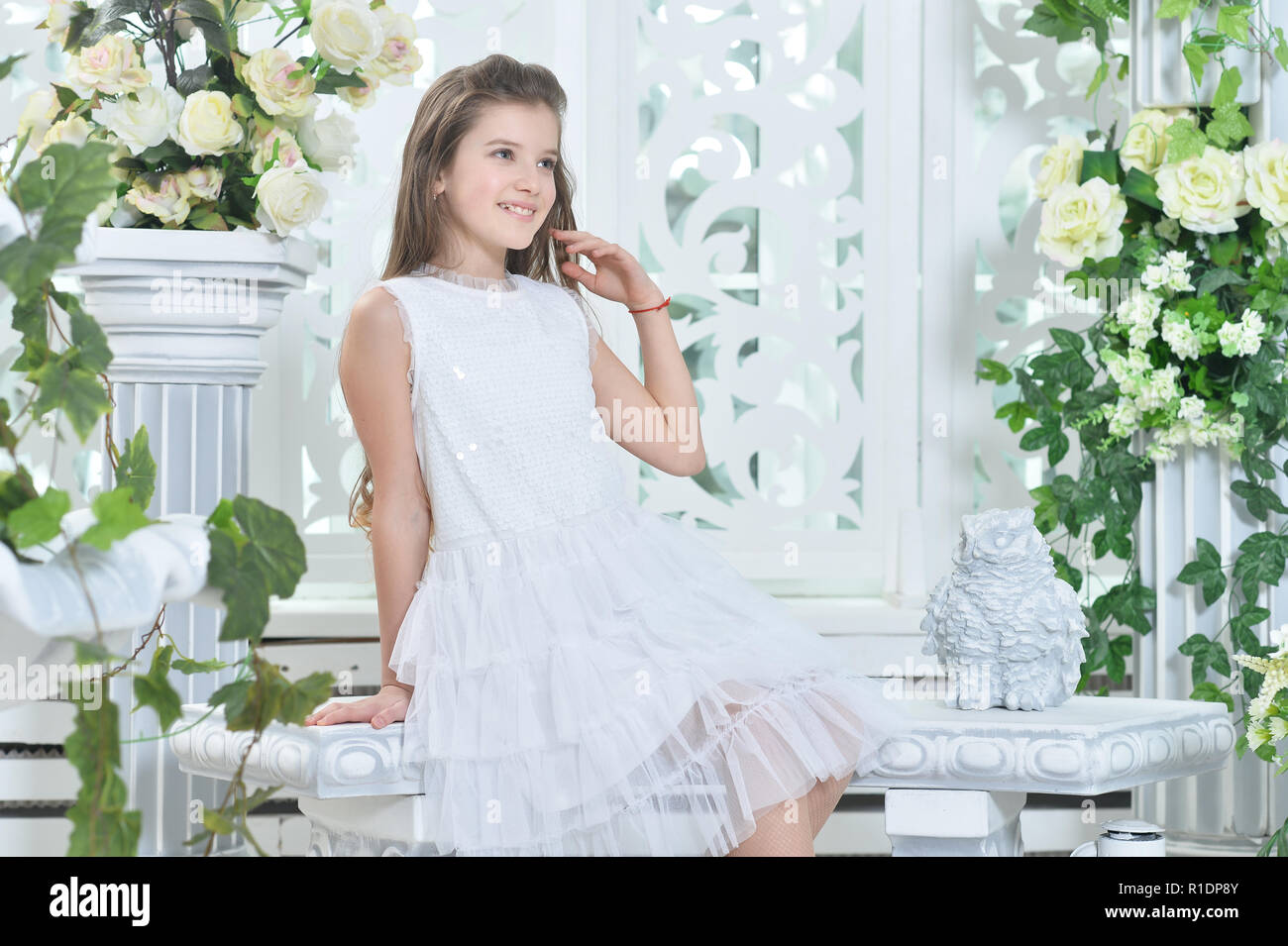 Portrait of a beautiful happy little girl in white dress Stock Photo ...