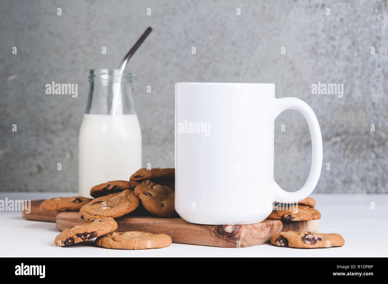 15oz mug mockup with cookies and milk Stock Photo
