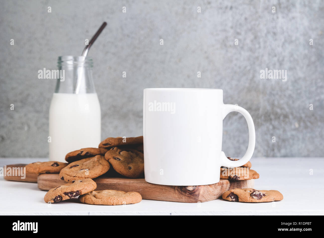 11oz white mug mock up with milk and cookies Stock Photo