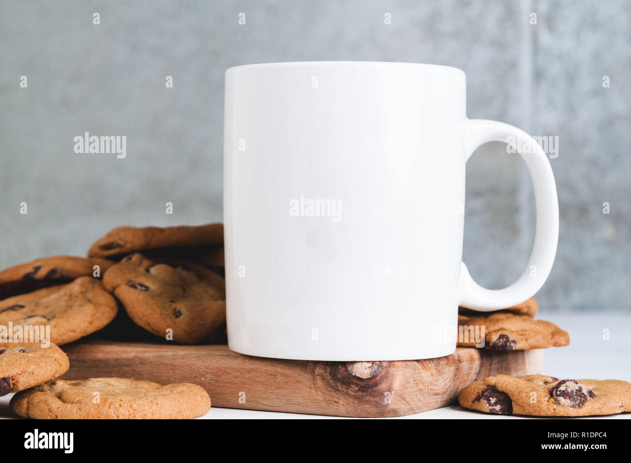 mug mockup with cookies Stock Photo