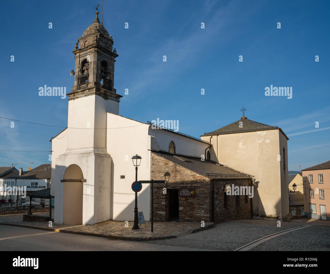 FONSAGRADA, SPAIN - AUGUST 25, 2018: Old church of Fonsagrada in evening light on August 25, 2018 in Asturias, Spain Stock Photo