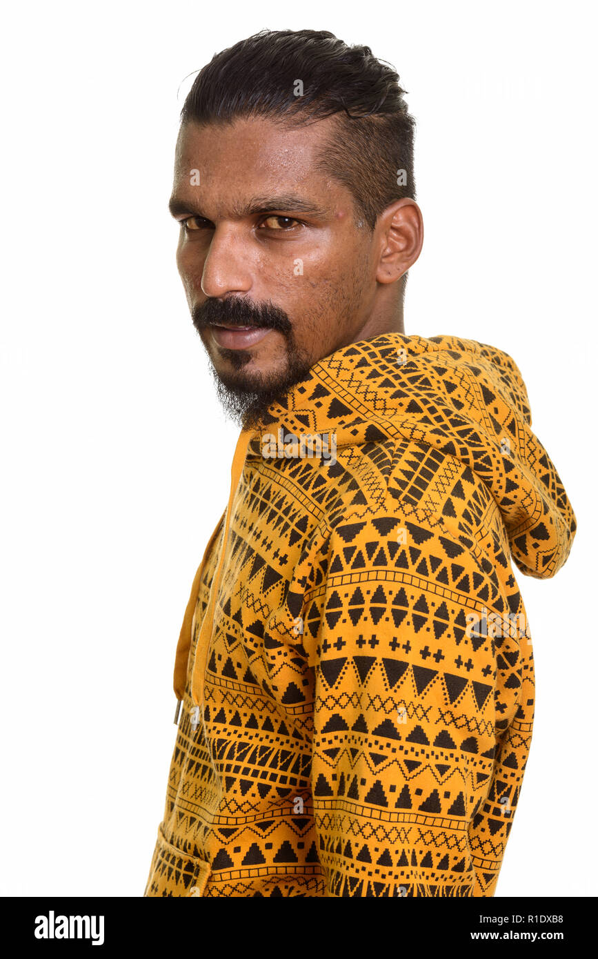 Young Indian man studio portrait against white background Stock Photo