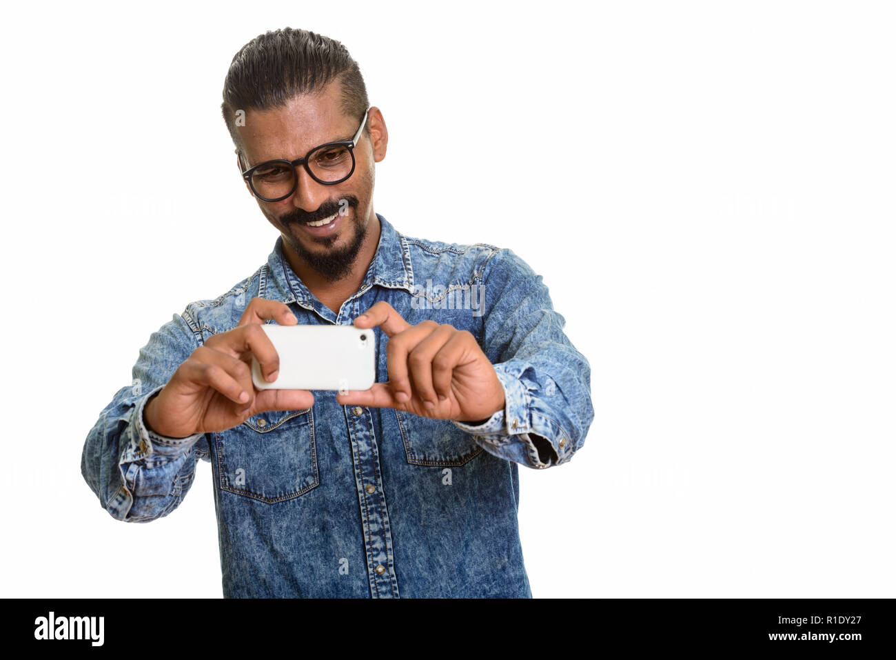 Photo of young indian man hi-res stock photography and images - Alamy