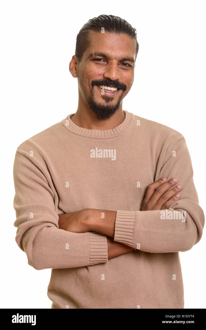 Young happy Indian man smiling with arms crossed Stock Photo Alamy