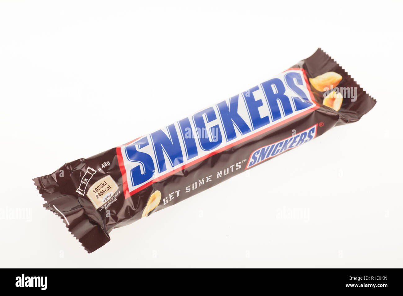 A single Fun Size Snickers candy bar isolated on white Stock Photo - Alamy