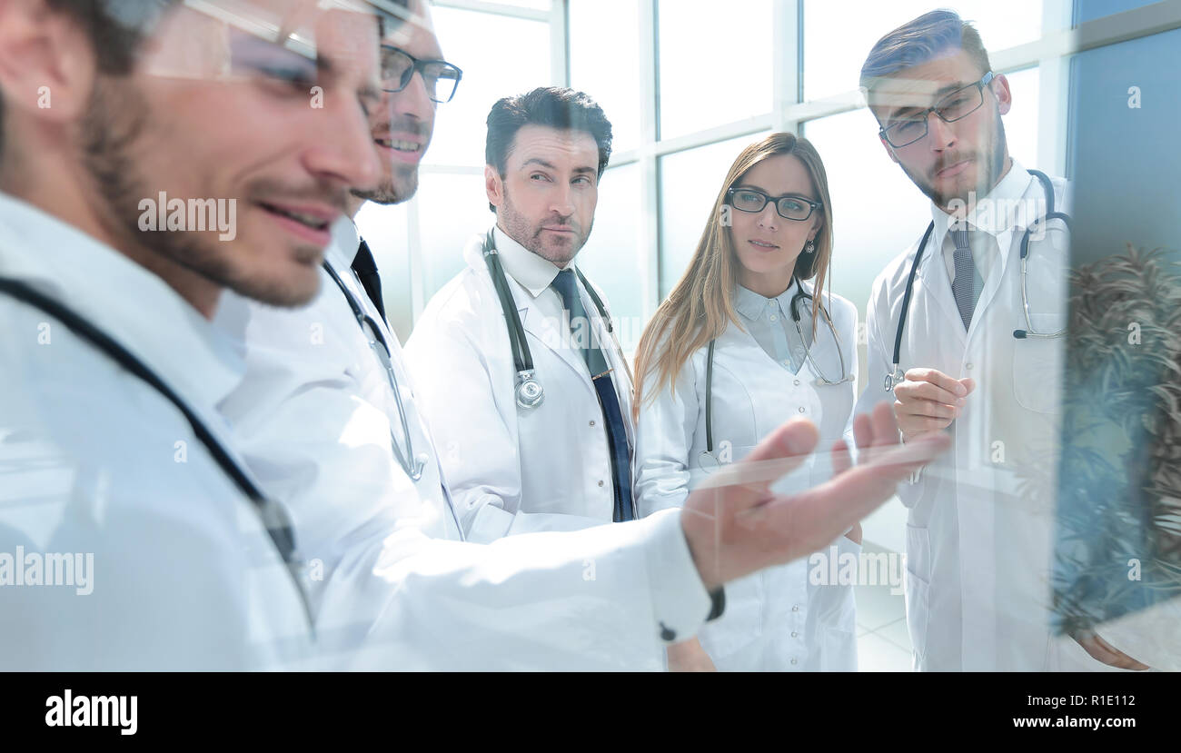 Group happy doctors discussing hi-res stock photography and images - Alamy