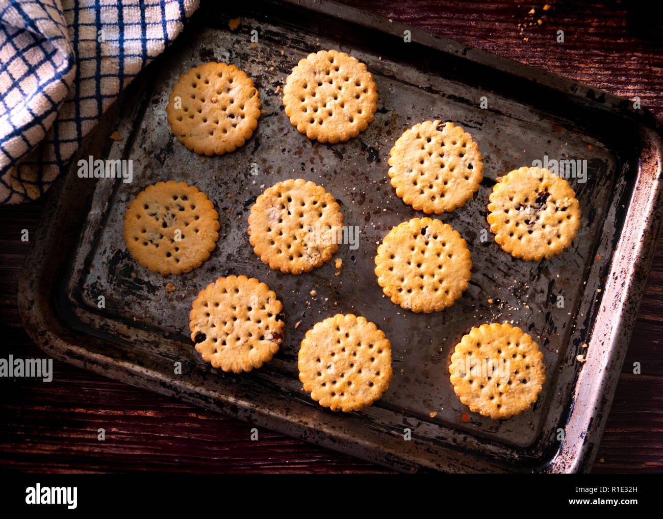 Fresh from the oven Biscuits on a baking tray Stock Photo - Alamy