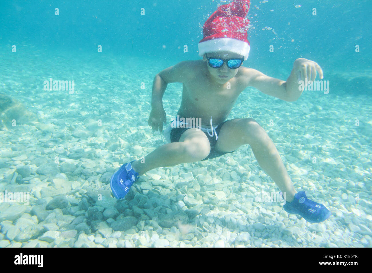 Santa Claus hat swimming underwater 