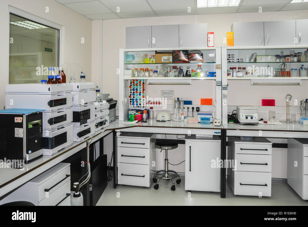 Modern chemical laboratory. The interior of the room is equipped for scientific research. Stock Photo