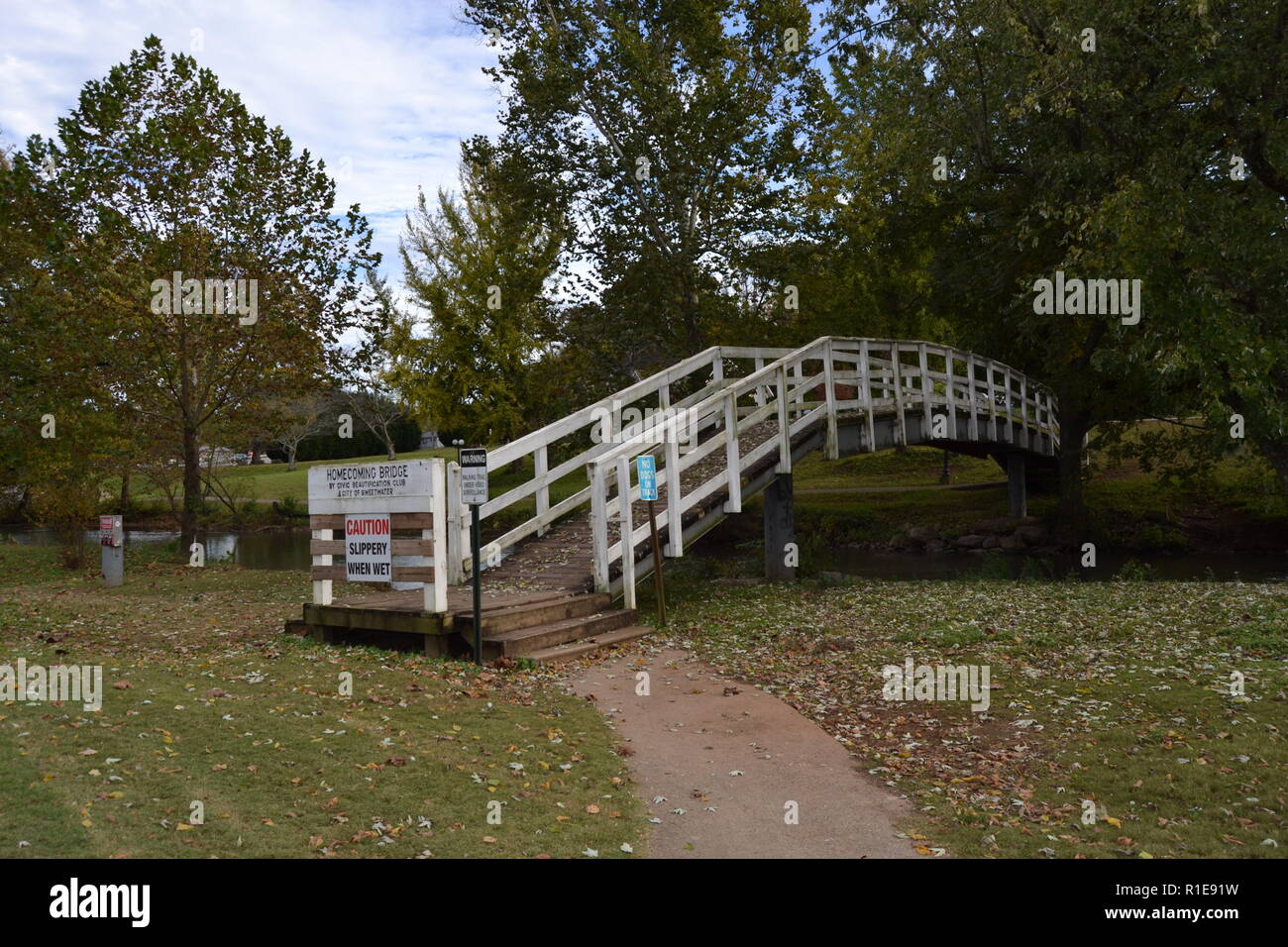 Sweetwater TN duck park bridge over the creek to the walking trail Stock Photo