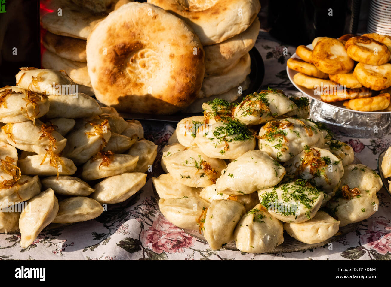 Traditional Ukrainian dumplings with fried onions at the festival of