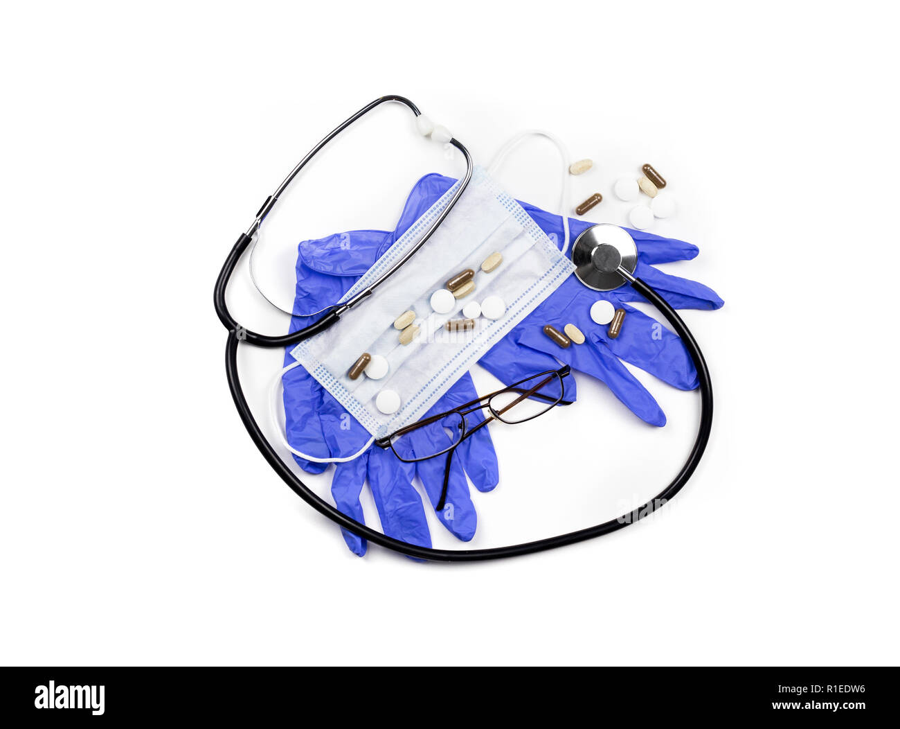 Donations in Health Care Industry concept. Money with medical instruments isolated on white. Stock Photo