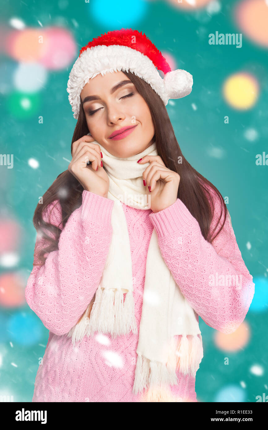 Model in sweater and christmas hat Stock Photo