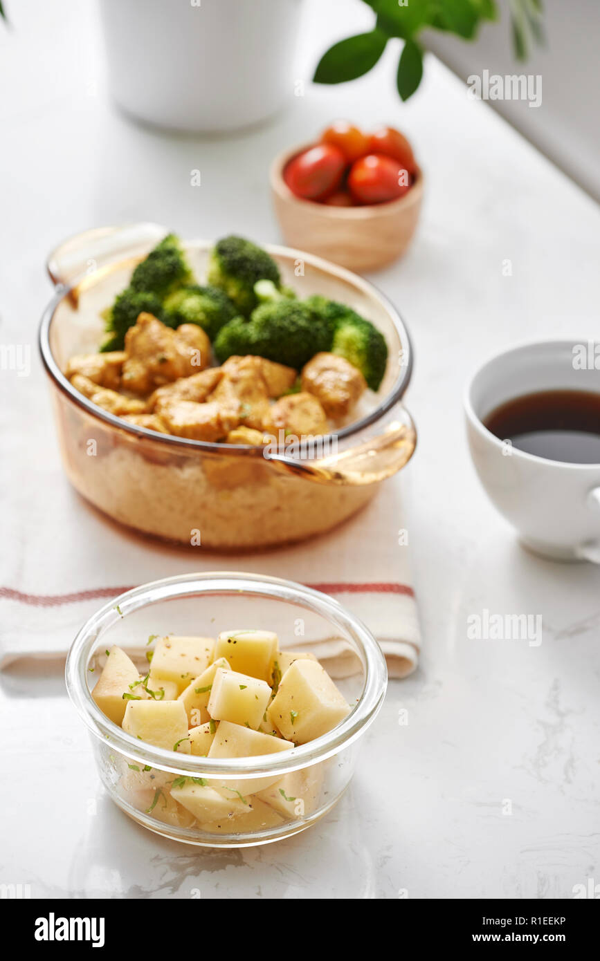 Lunch Rice topped with stir-fried chicken and broccoli, Coffee in the daytime Stock Photo