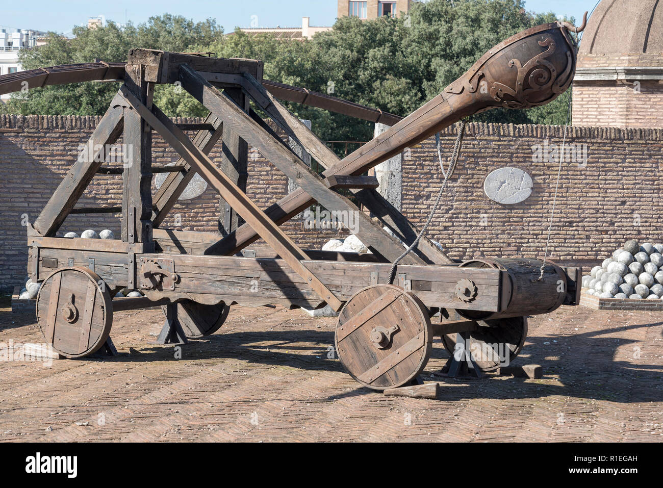 A Wooden Ballistic Device Of A Medieval Catapult. Ancient military Equipment in the castle of St. angel in Rome. Stock Photo