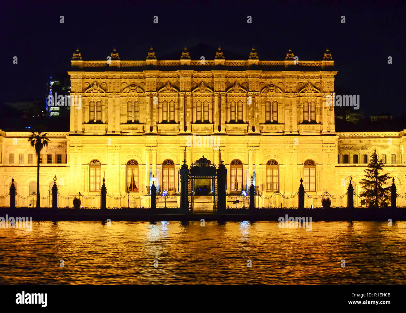 Istanbul, TURKEY, September 19 - 2018. Dolmabahce palace seen from the water at night. Stock Photo