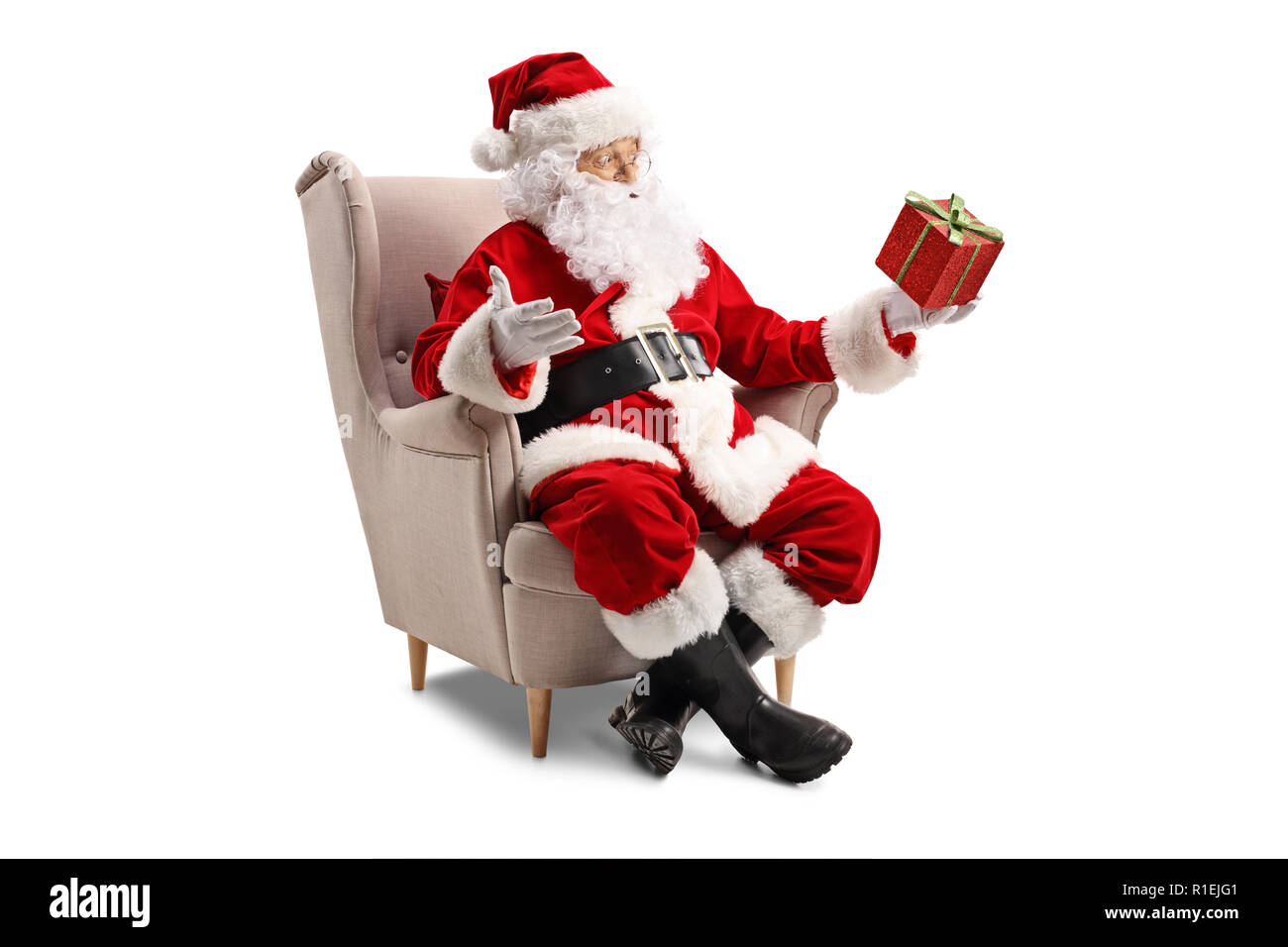 Santa claus sitting on a chair hi-res stock photography and images - Alamy