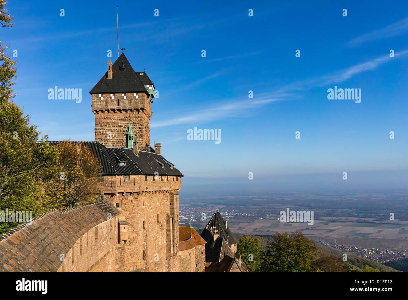Haut-Koenigsbourg castle overlooking the plain of Alsace on a sunny day, France. Stock Photo
