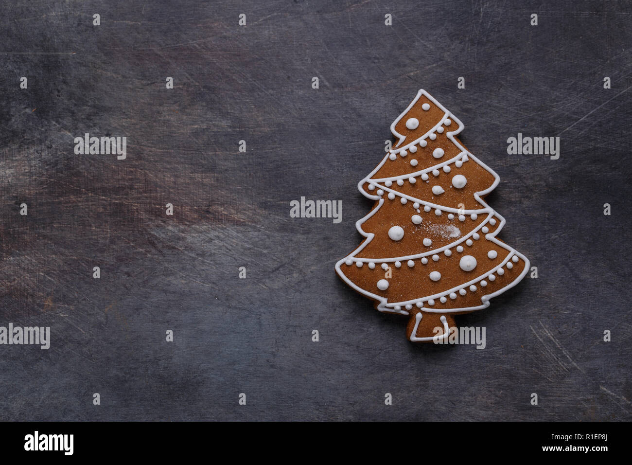 Gingerbread cookies tree on dark background, copyspace Stock Photo