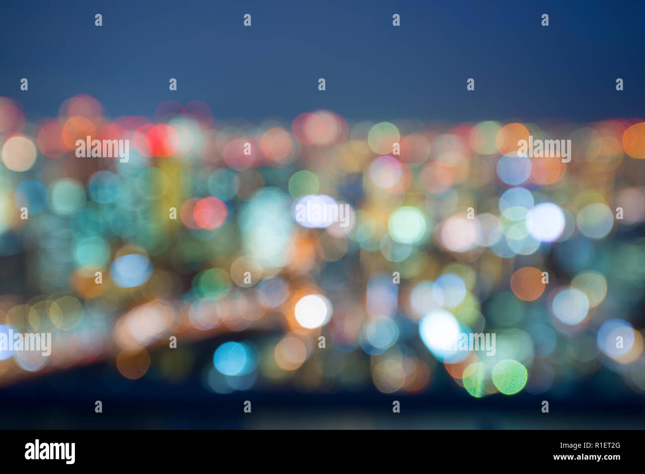 Blurred night lights of Osaka city central business downtown for ...