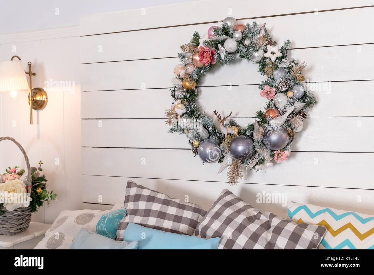 Wreath Of Christmas Balls Above The Bed New Year Decoration
