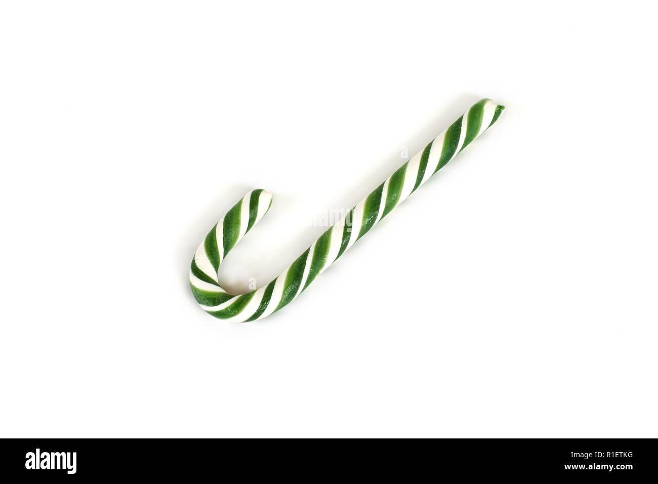 Christmas candy cane isolated on white background Stock Photo - Alamy