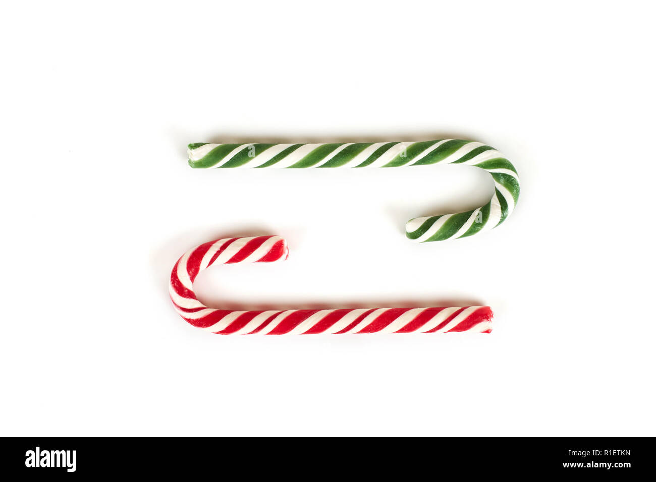 Christmas candy cane isolated on white background Stock Photo - Alamy