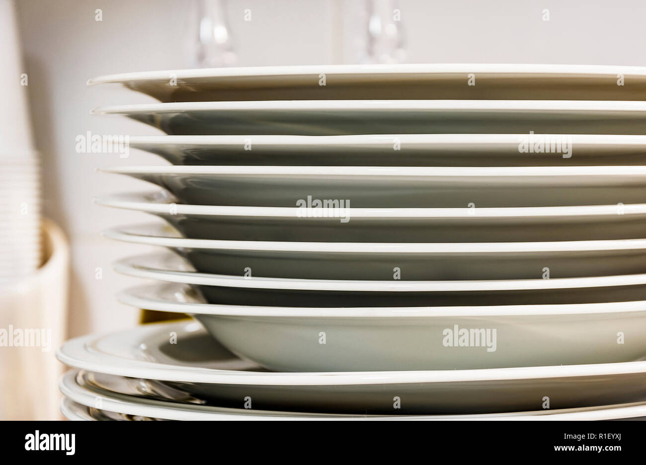 view of a group of stacked dishes in a modern kitchen Stock Photo