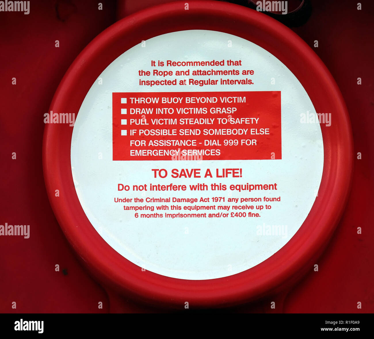Life saving ring for deep water. Instructions for use on container. Stock Photo