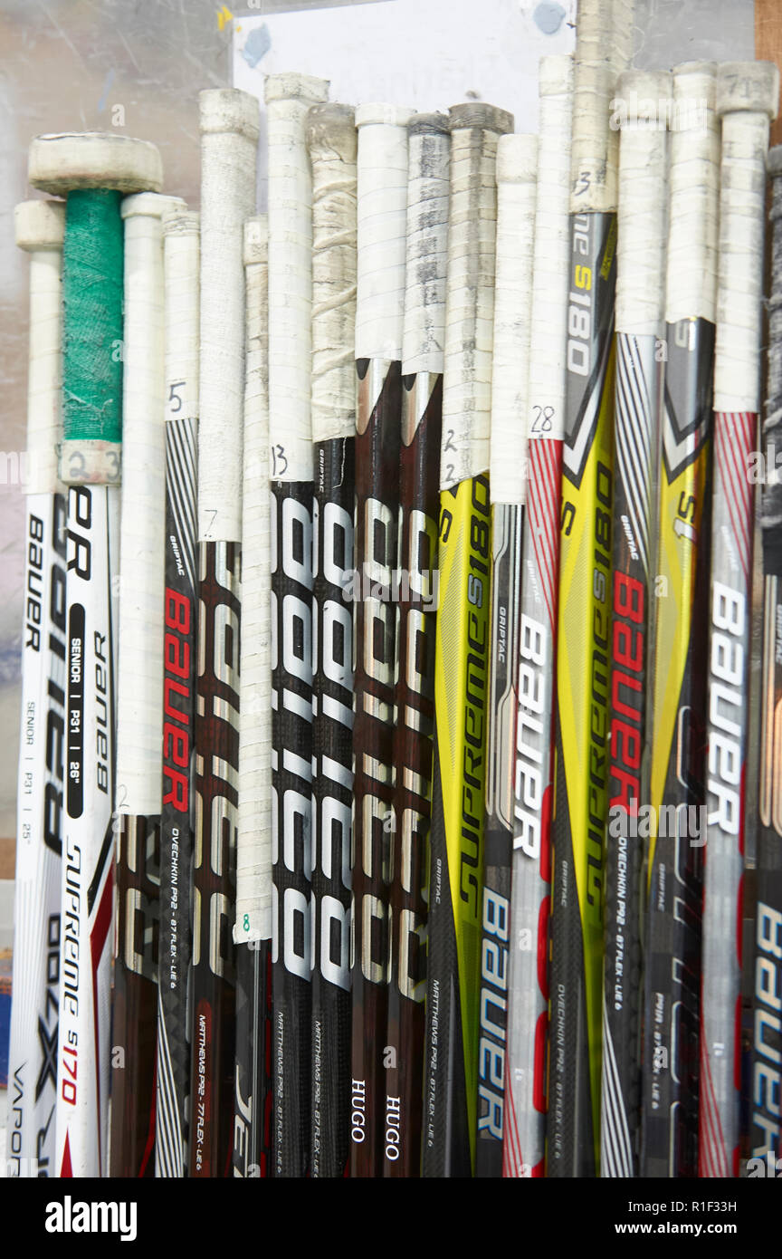 Ice Hockey sticks at the end of a period in the game. Stock Photo