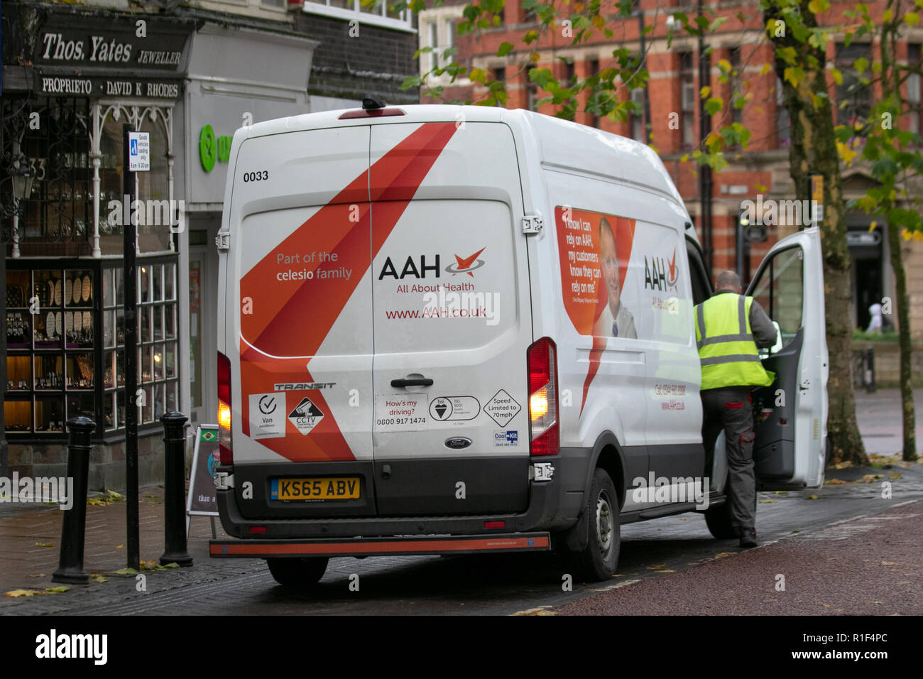 AAH delivery van & man in Preston, UK Stock Photo