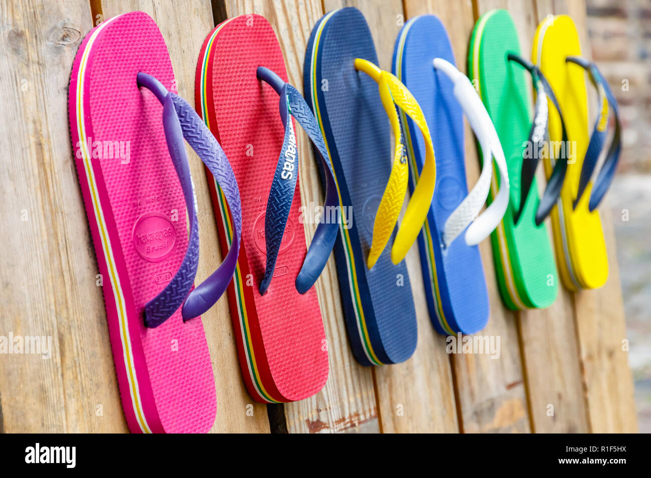 London, UK - September 1, 2018 - Flip flops in various colours on display at Camden Town Stock Photo