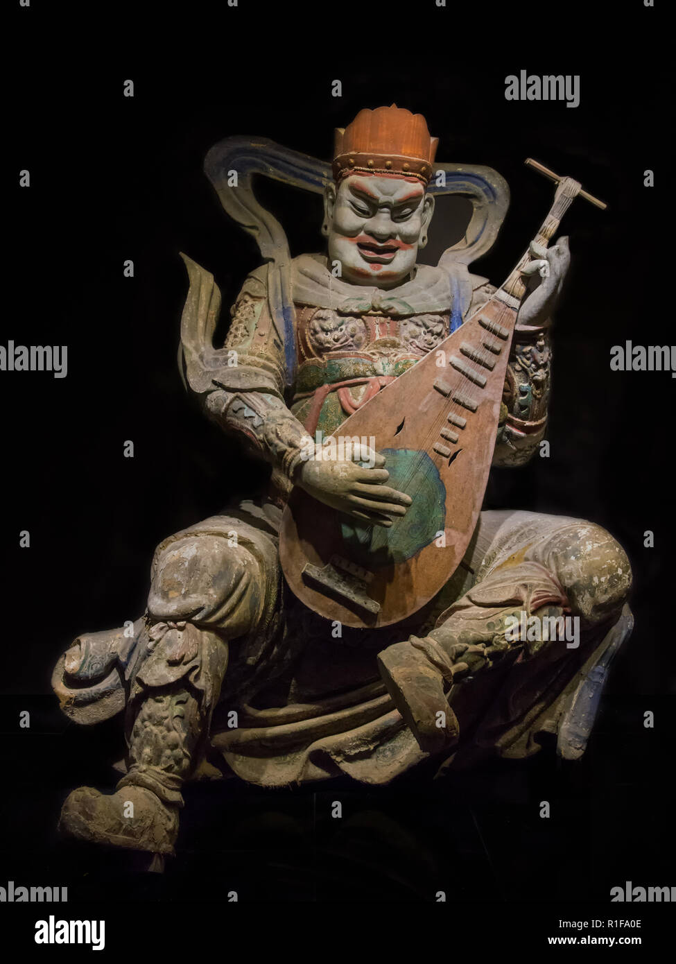 LUSHUN, LIAONING, CHINA - 22JUL2018: Statue of Dhrtarastra, housed in the Lushun Museum. Stock Photo