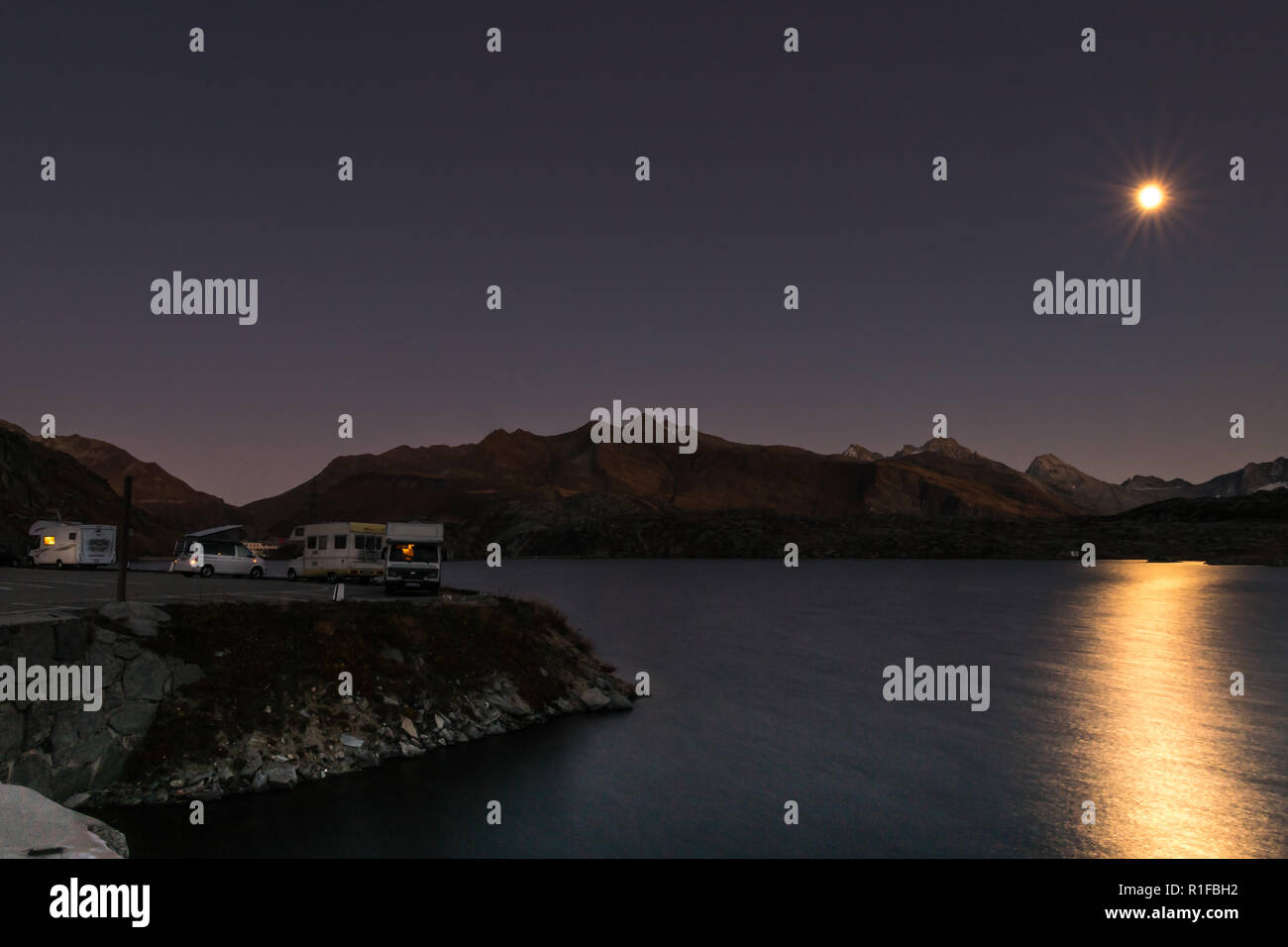 Mobile homes at night in the swiss alps Stock Photo