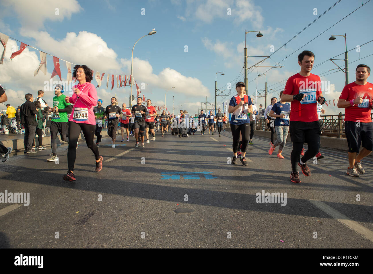 Vodafone 40th.Istanbul Marathon held today. Thousands of participant also run on the Famous Galata Bridge. Stock Photo