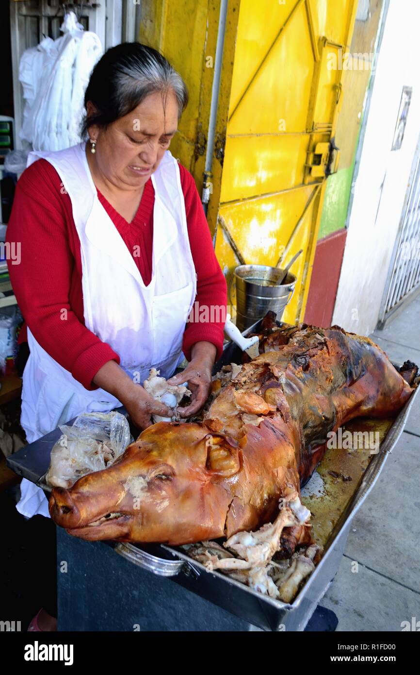 Roasted suckling pig  - HUARAZ. Department of Ancash.PERU                     Stock Photo