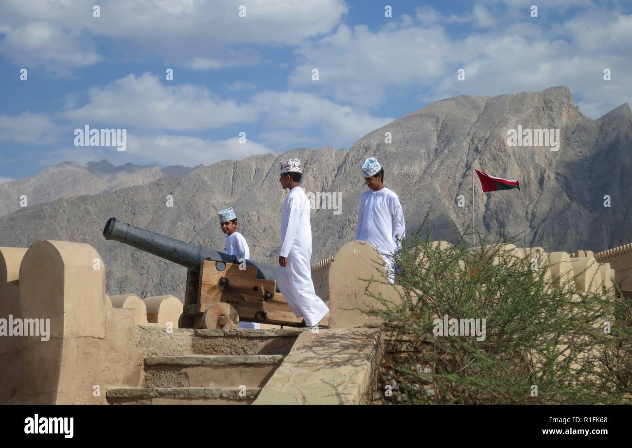 Omani students visit the mighty fortress of Nakhl (Nakhal), one of Oman's most famous sights. The fort was extensively renovated in the 1990s. | usage worldwide Stock Photo