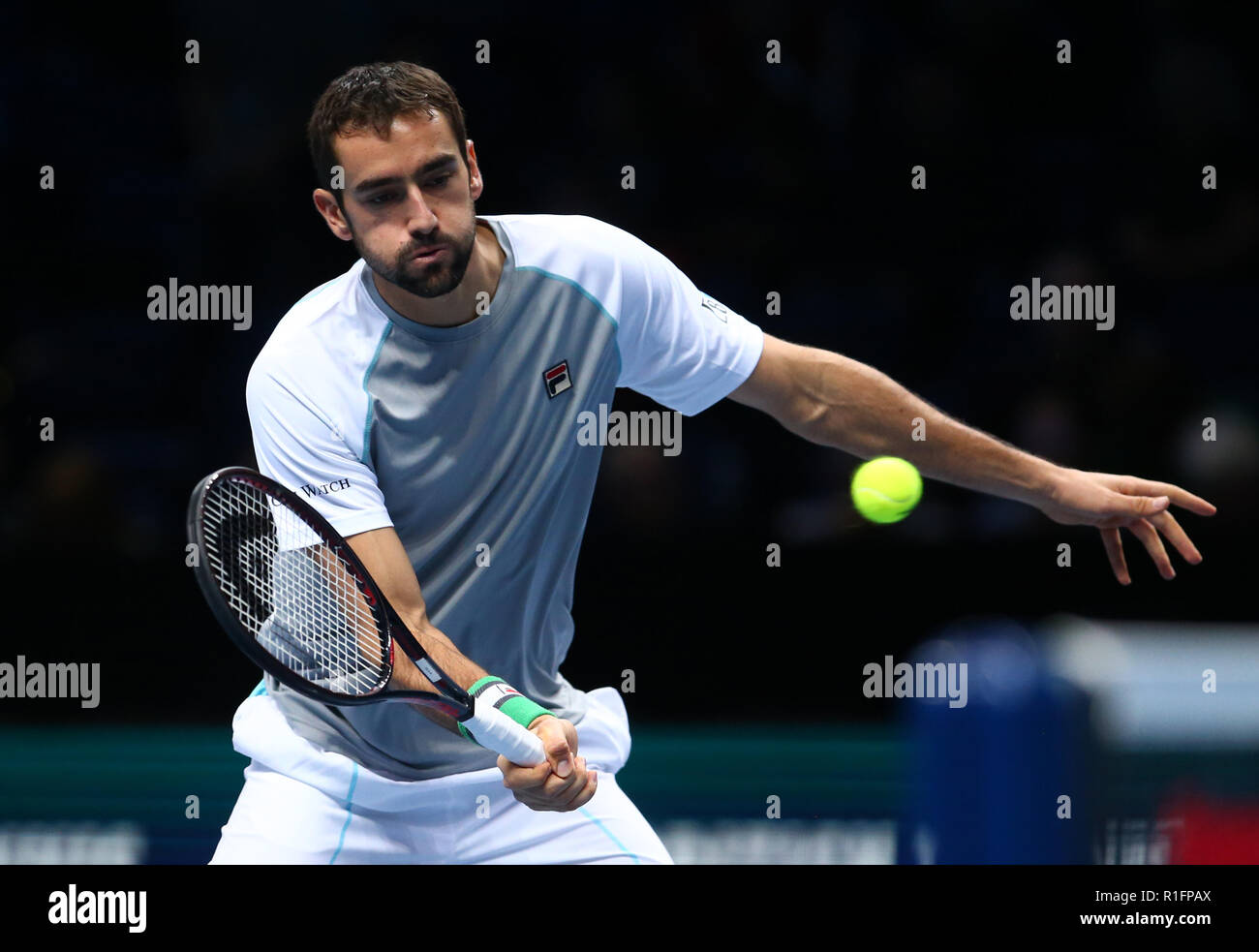 London, UK. November 12, 2018. Marin Clilic (FRA) returns to Alexander  Zverev (GER) during Day One Singlesof the Nitto ATP World Tour Finals played  at The O2 Arena, London on November 12