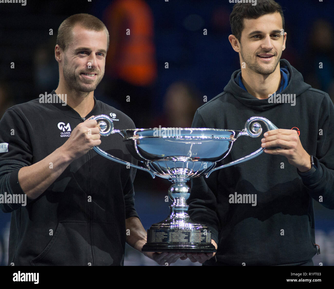 O2, London, UK. 12 November, 2018. Oliver Marach (AUT) and Mate Pavic (CRO)  receive the ATP No.1 Doubles Award on centre court. Credit: Malcolm  Park/Alamy Live News Stock Photo - Alamy