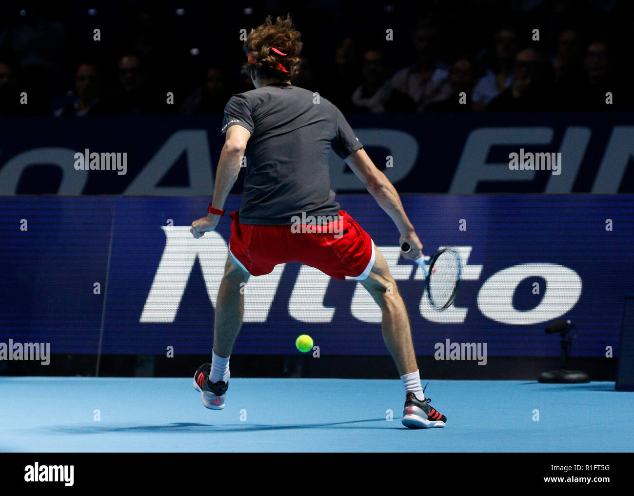 London, UK. 12th November, 2018. O2 Arena, London, England; Nitto ATP  Tennis Finals; Alexander Zverev (GER) plays a tweener shot between his legs  in his match against Marin Cilic (CRO) Credit: Action